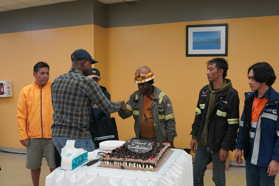 George Banini handed over a birthday present to birthday employees