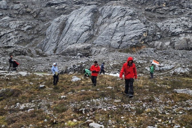 They hiked for 3 hours through steep, extreme terrain in heavy rain while collecting climbers’ trash