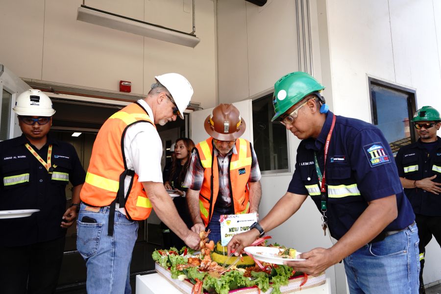 Cutting of the tumpeng as an expression of gratitude for the inauguration of the new office building